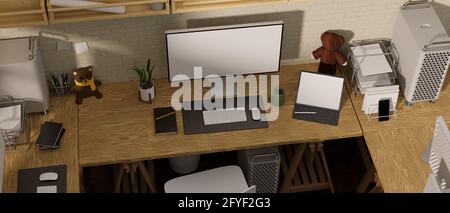 3D rendering, office workspace with computer devices with mock up screen, office supplies and decoration on wooden table, 3D illustration Stock Photo