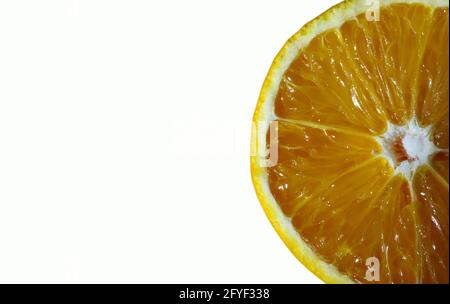 Close up of a sweet orange, sliced and isolated on white background