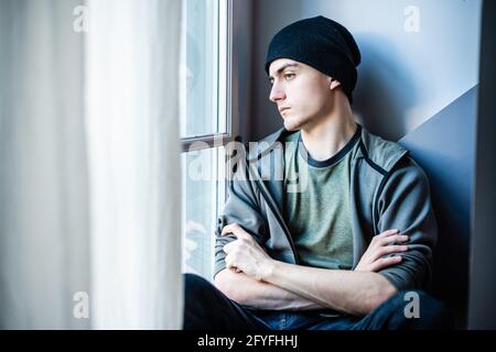 Sad young man, France. Stock Photo