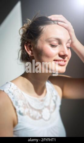 Woman in sunglasses sunbathing. Stock Photo