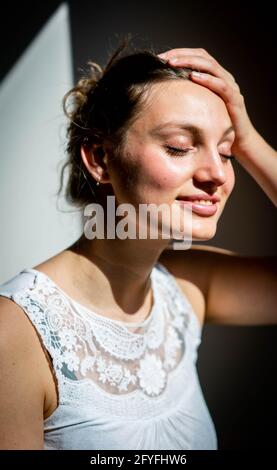 Woman in sunglasses sunbathing. Stock Photo
