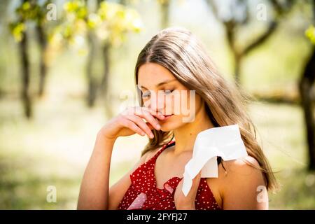 Woman suffering from allergic rhinitis. Stock Photo