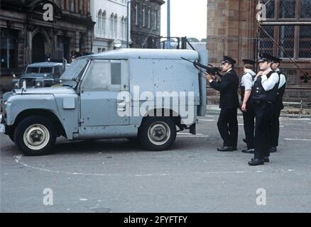 BELFAST, UNITED KINGDOM - SEPTEMBER 1978. RUC, Royal Ulster Constabulary, policeman on Patrol of Belfast Streets during The Troubles, Northern Ireland, 1970s Stock Photo