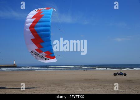 Berwick upon Tweed, UK, 28th May, 2021. UK Weather. A beautiful warm sunny afternoon for kite buggies on Spittal beach to start the May bank holiday weekend. Northumberland  Credit: Gary Learmonth / Alamy Live News Stock Photo