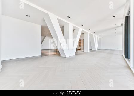 Wall windows with triangle pillar viewing cityscape from luxury ...
