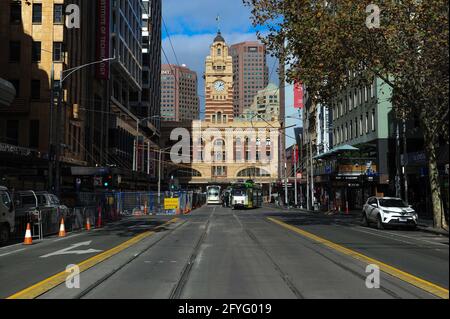 Melbourne, Australia. 28th May, 2021. An empty street is seen amid the COVID-19 pandemic in Melbourne, Australia, on May 28, 2021. Australia has seen the COVID-19 vaccine doses administered surpass 4 million, almost two months after the government's initial deadline for the target. Credit: Xue Bai/Xinhua/Alamy Live News Stock Photo