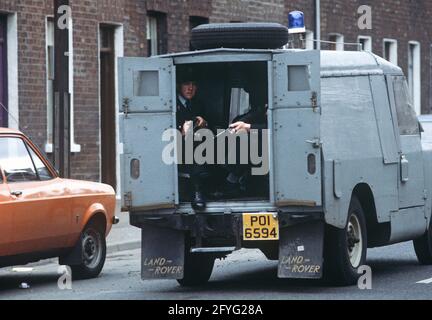 BELFAST, UNITED KINGDOM - SEPTEMBER 1978. RUC, Royal Ulster Constabulary, Policeman on Patrol in Belfast during The Troubles, Northern Ireland, 1970s Stock Photo