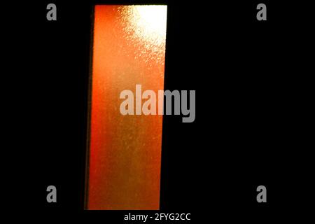 Orange Rectangular Window Surrounded by Black Stock Photo