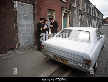 BELFAST, UNITED KINGDOM - SEPTEMBER 1978. RUC, Royal Ulster Constabulary, Policeman on Patrol in Belfast during The Troubles, Northern Ireland, 1970s Stock Photo