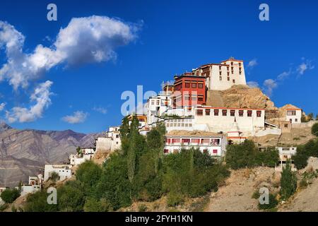 Thiksay monastery with view of Himalayan mountians and blue sky in background,Ladakh,Jammu and Kashmir, India Stock Photo