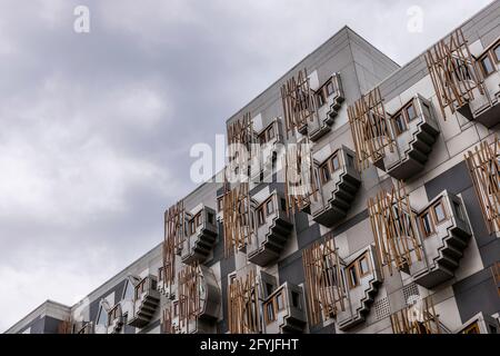 A photograph of the members block of the Scottish Parliament. There are geometric windows called thinking pods or contemplation pods in rows Stock Photo