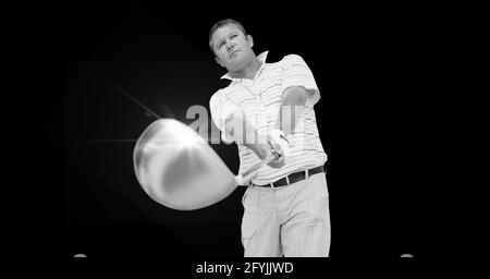 Composition of caucasian male golf player with golf club with copy space in black and white Stock Photo