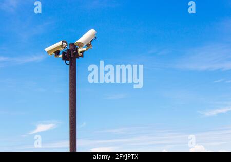 closed circuit camera on the sky background Stock Photo
