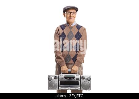 Elderly man standing and holding a boombox radio isolated on white background Stock Photo