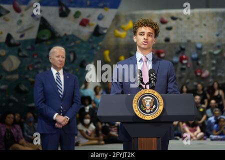 Alexandria, United States. 28th May, 2021. President Joe Biden is introduced by 17-year-old Jacob Bosley during a visit to the Sportrock Climbing Center to recognize the progress Virginia has made in the fight against COVID-19, in Alexandria, Virginia on Friday, May 28, 2021. Photo by Chris Kleponis/UPI Credit: UPI/Alamy Live News Stock Photo