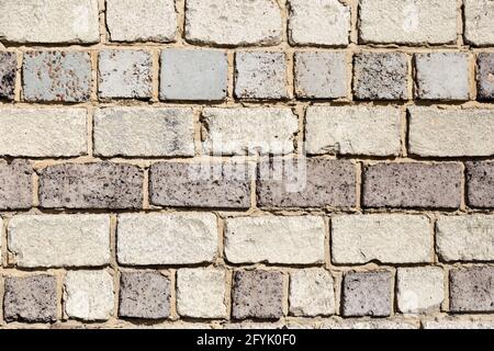 Wall made of stone and marble blocks of different texture Stock Photo