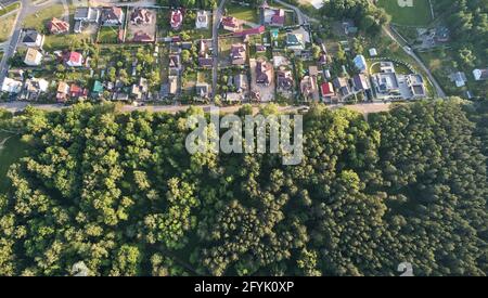Town district in green park area aerial above top view Stock Photo