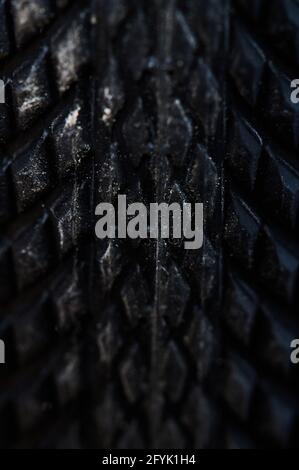 Surface of black bicycle tire macro close up view Stock Photo