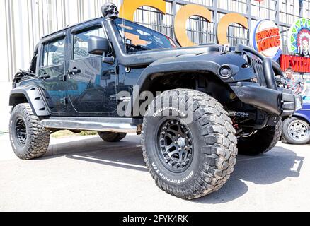 Samara, Russia - May 15, 2021: Tuned Jeep Wrangler vehicle with all terrain tires BFGoodrich. Black all terrain vehicle 4x4 Stock Photo