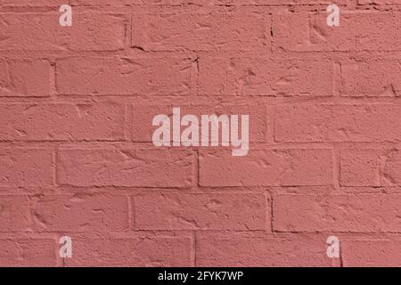Close up of painted orange brick wall texture background. Stock Photo
