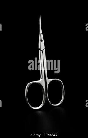metal manicure scissors isolated on black Stock Photo