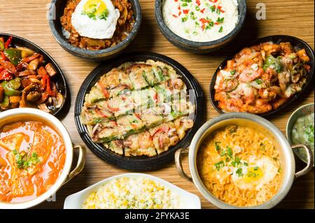 A menu selection of traditional Korean dishes at an Asian restaurant. Stock Photo