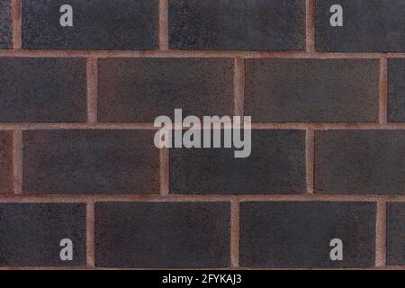 Close up of dark orange brick wall texture background. Stock Photo