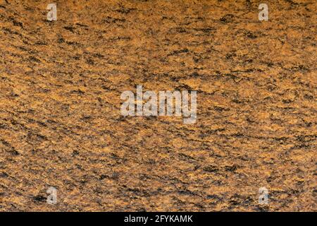 Orange stone granite textured abstract wall background. Stock Photo