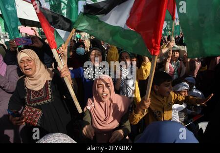 Rafah, Gaza. 28th May, 2021. Palestinian Hamas supporters chant slogans during an anti-Israel rally in Rafah, in the southern Gaza Strip, on Friday, May 28, 2021. Photo by Ismael Mohamad/UPI Credit: UPI/Alamy Live News Stock Photo