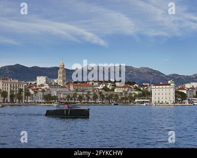SPLIT, CROATIA - May 14, 2021: Speed boat in front of Split harbour in Croatia on Adriatic coast Stock Photo