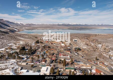 LEE VINING, CALIFORNIA, UNITED STATES - Apr 18, 2021: An aerial drone photograph of the quaint tourist town of Lee Vining with Mono Lake in the backgr Stock Photo