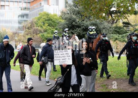 Melbourne, Australia 29 May 2021, A small group of protesters during a planned 'Millions March' rally at Flagstaff Gardens, that had been canceled by organisers due to the snap lockdown. Hardcore anti-lockdown and anti-vaccination protesters still attend the park and rallied against the government. Credit: Michael Currie/Alamy Live News Stock Photo