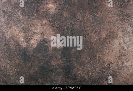 abstract brown chocolate metallic background texture concrete or plaster hand made wall Stock Photo