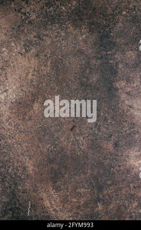 abstract brown chocolate metallic background texture concrete or plaster hand made wall Stock Photo