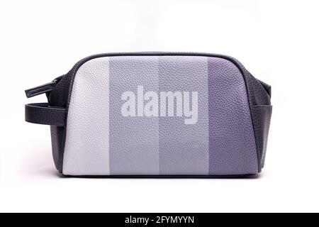 leather striped bag of makeup grey shades on a white background Stock Photo