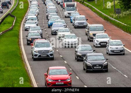 Traffic jams on the motorway in Preston; Lancashire. UK Weather May 2021.; The great British Bank Holiday getaway.; Congestion with vehicular queueing on the M6 as heavy traffic slows progress to the Lake District and north-west tourist resorts.; Credit; MediaWorldImages/AlamyLiveNews Stock Photo