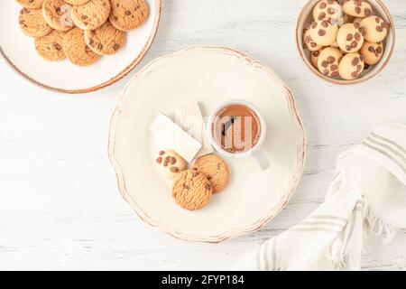 Turkish coffee served with variety of cookie and biscuits on table Stock Photo