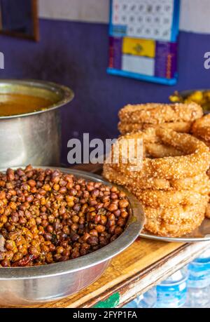 Nepal Rice Roti Sel Roti is a traditional Nepalese ring-shaped sweet fried dough made ...