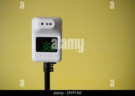 Closeup shot of thermometer scanner, Automatic thermometer for checking body temperature Stock Photo