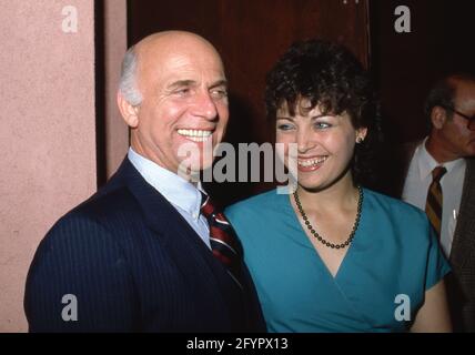 **FILE PHOTO** Gavin MacLeod Has Passed Away At 90. Gavin MacLeod and friend May 1983 Credit: Ralph Dominguez/MediaPunch Stock Photo