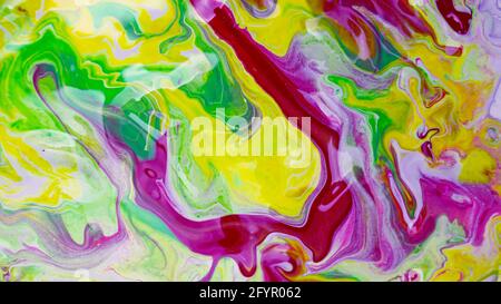 Mixed krill paint colors. Beautiful background of acrylic paints in shades of pink and yellow, abstract background, marble texture, background Stock Photo