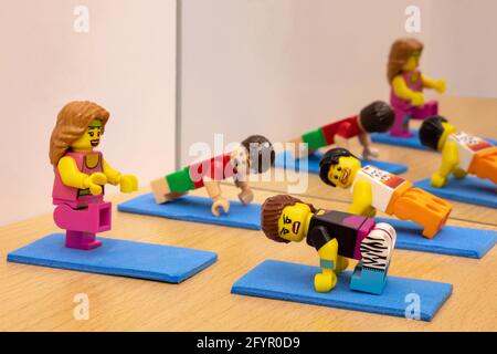 LUTON, UNITED KINGDOM - May 20, 2020: A fitness studio as represented with Lego figures Stock Photo