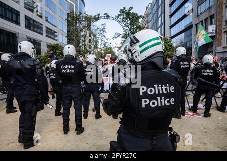 Illustration shows police to block the 'European Manifestation for Freedom' who decided to go from the Bois de La Cambre - Ter Kamerenbos, to Schuman Stock Photo