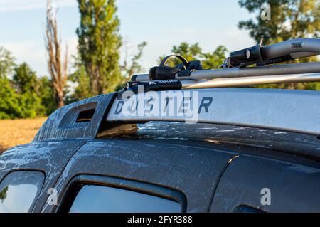 Thule bicycle mount on top of Renault Duster in Onishki Ukraine