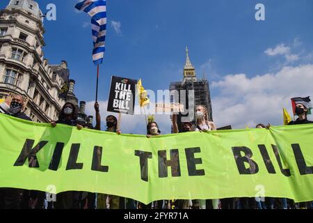 London, UK. 29th May, 2021. Demonstrators hold a banner in Parliament Square during the Kill The Bill protest.Various groups of protesters marched through Central London in opposition to the Police, Crime, Sentencing and Courts Bill. Credit: SOPA Images Limited/Alamy Live News Stock Photo