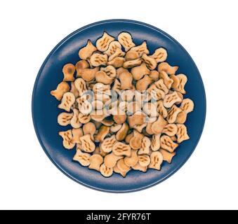 small crackers on plate isolated on white Stock Photo