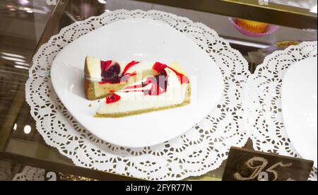 cakes on plate in cafe display Stock Photo