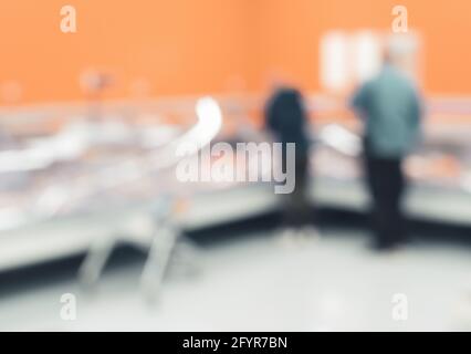 abstract defocused shoppers at supermarket Stock Photo