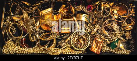 gold jewelry, closeup in dark Stock Photo