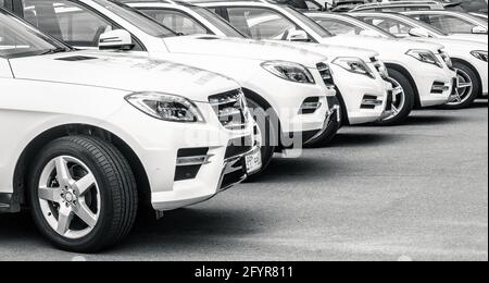 2015: Mercedes Benz white cars parked on the rent a car service Stock Photo